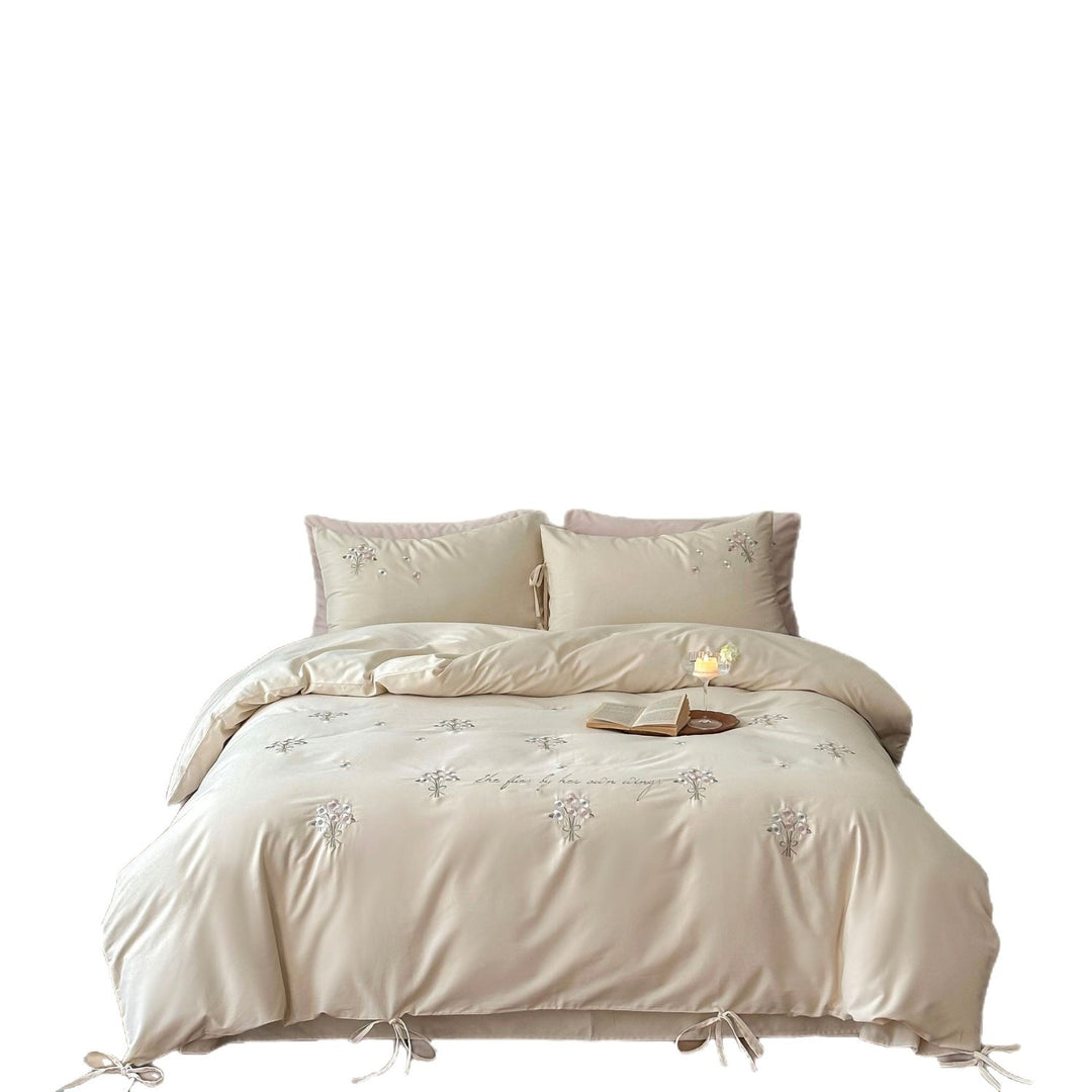Luxurious satin bedding set with delicate pearl flower embroidery and tie ribbons