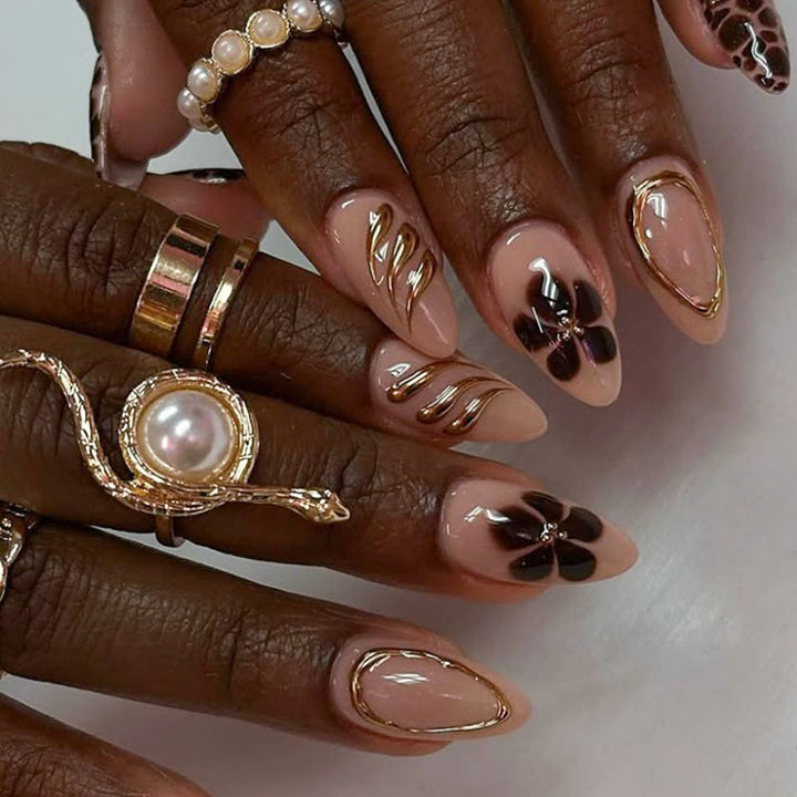Artistic Press-On Nail Set with Floral and Gold Accents