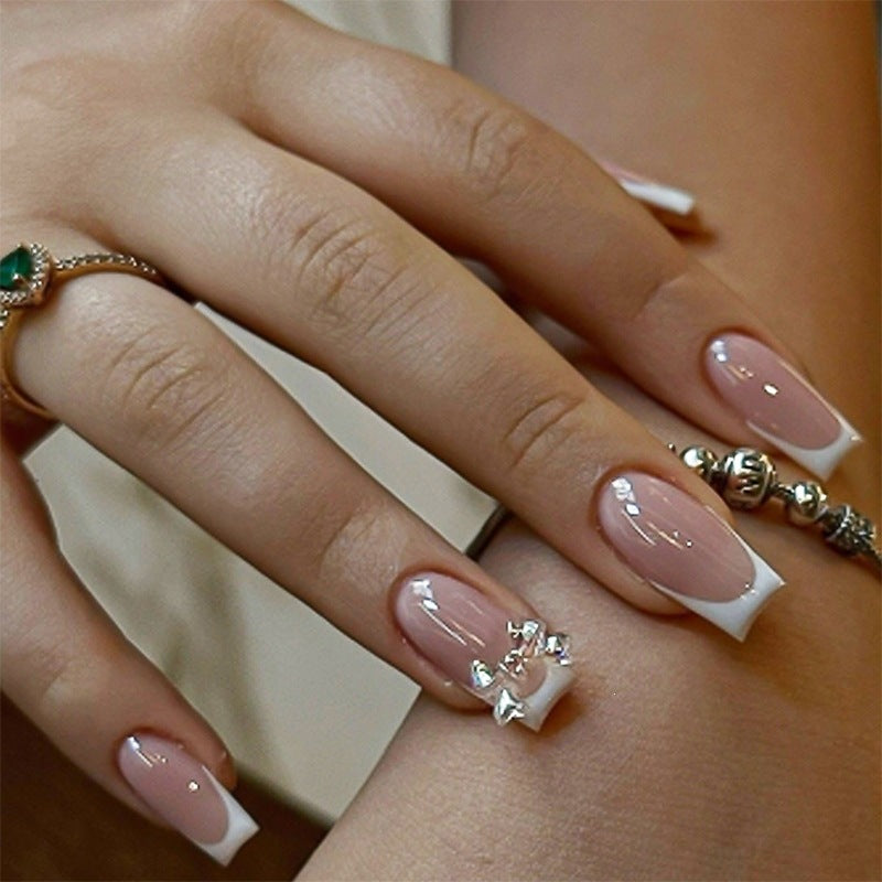 Elegant artificial nails with delicate glitter and decorative accents Kalsten