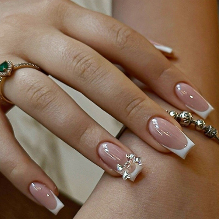 Elegant artificial nails with delicate glitter and decorative accents Kalsten