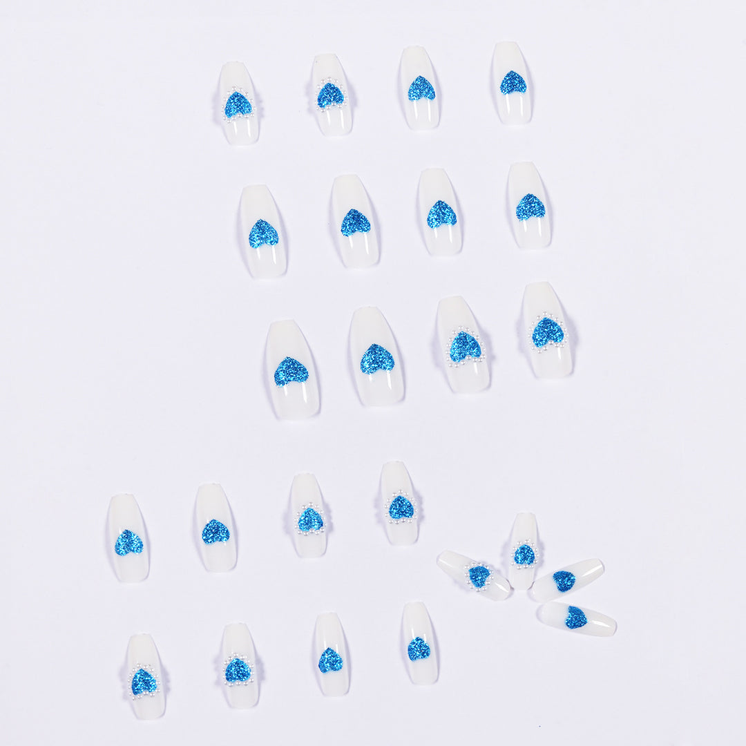 Artful nail art with heart-shaped accents Kalsten