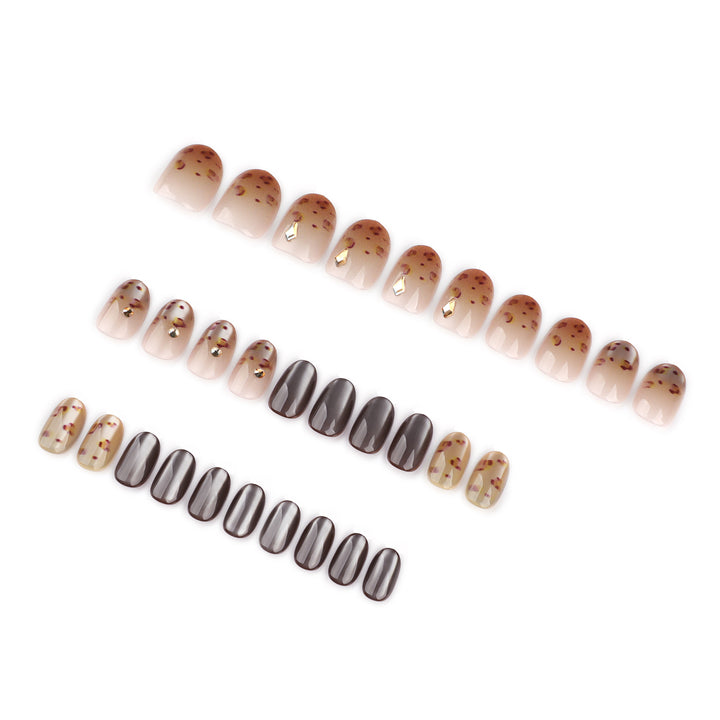 Artistic nail art with glitter accents and elegant design Kalsten