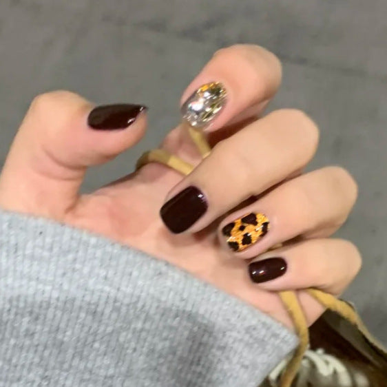 Artistic Press-On Nail Set with Decorative Elements