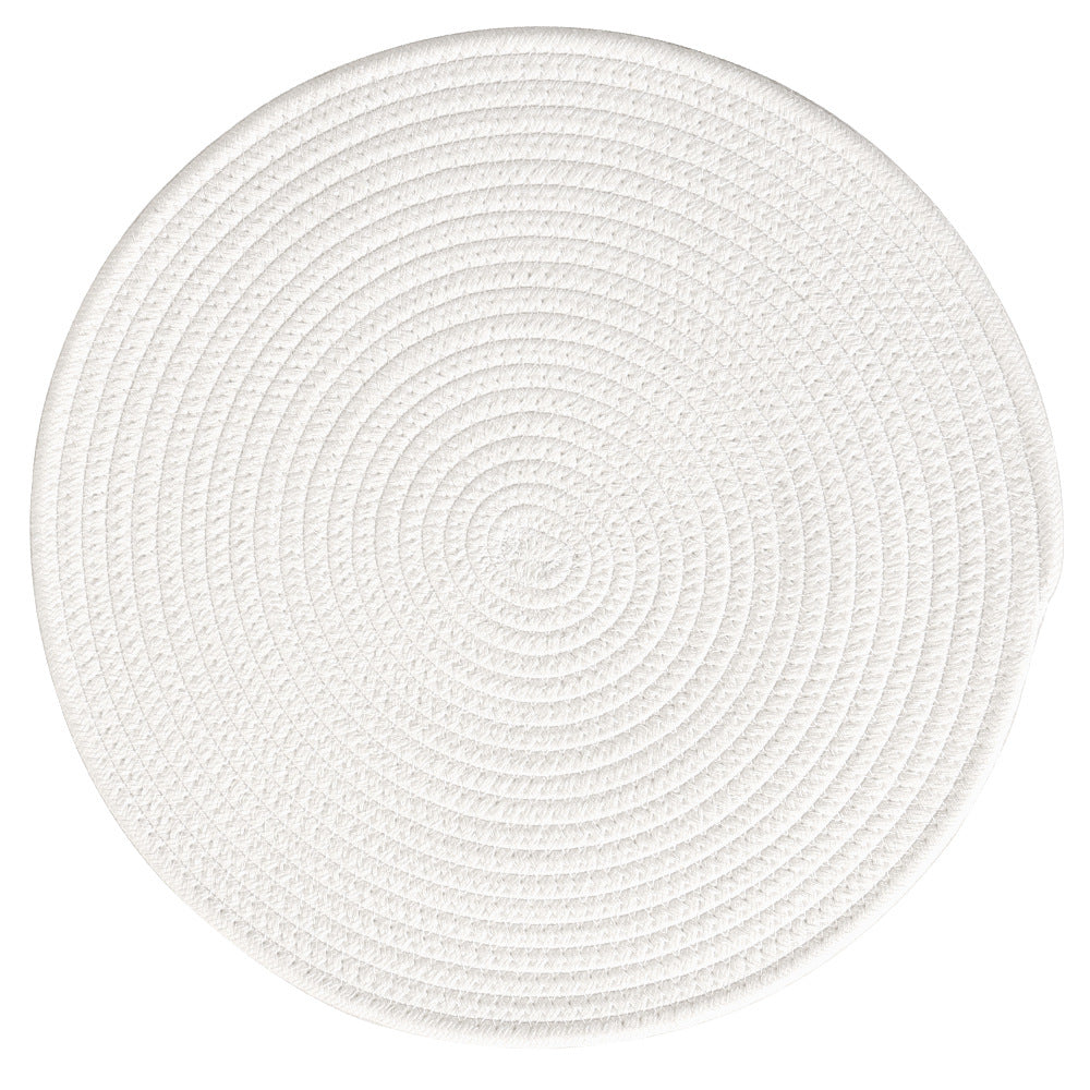 Round woven placemats made of cotton and jute rope with spiral pattern