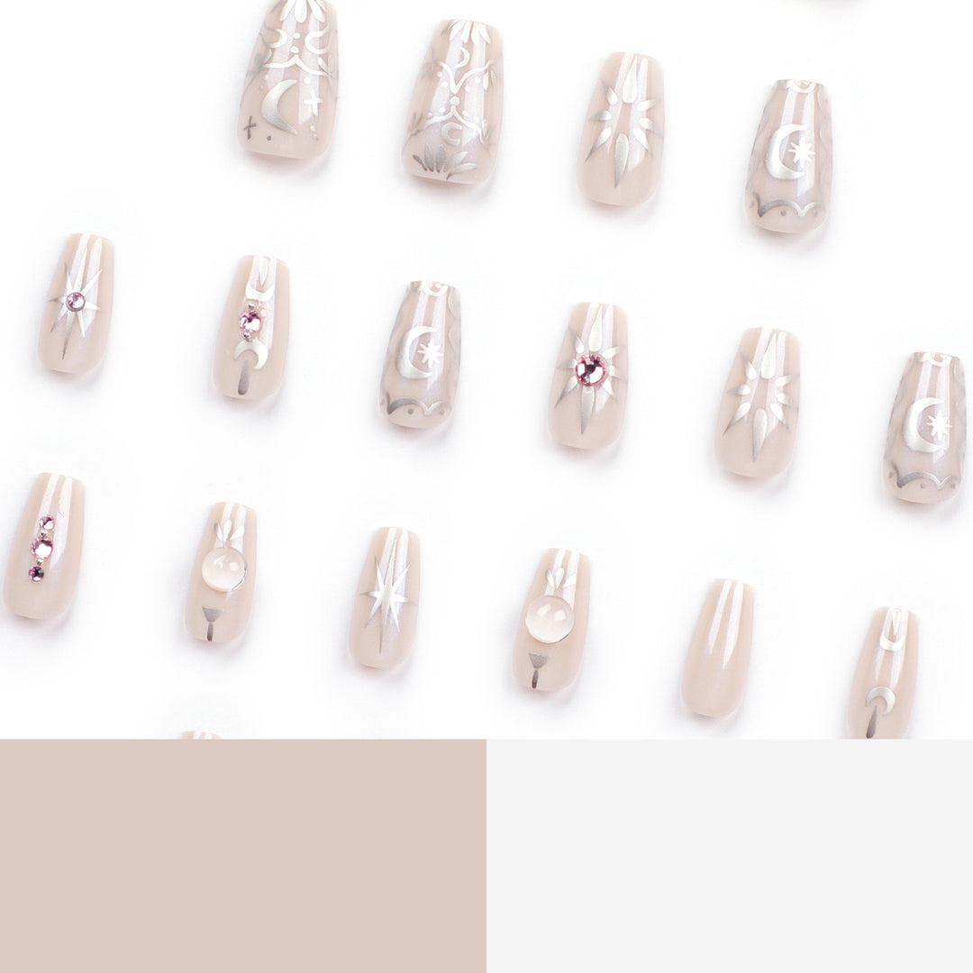Artificial nail art with elegant rhinestone and glitter effects Kalsten