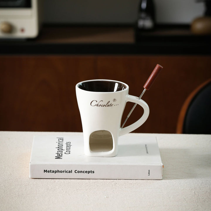 Ceramic mug with integrated tea strainer and silicone drinking straw