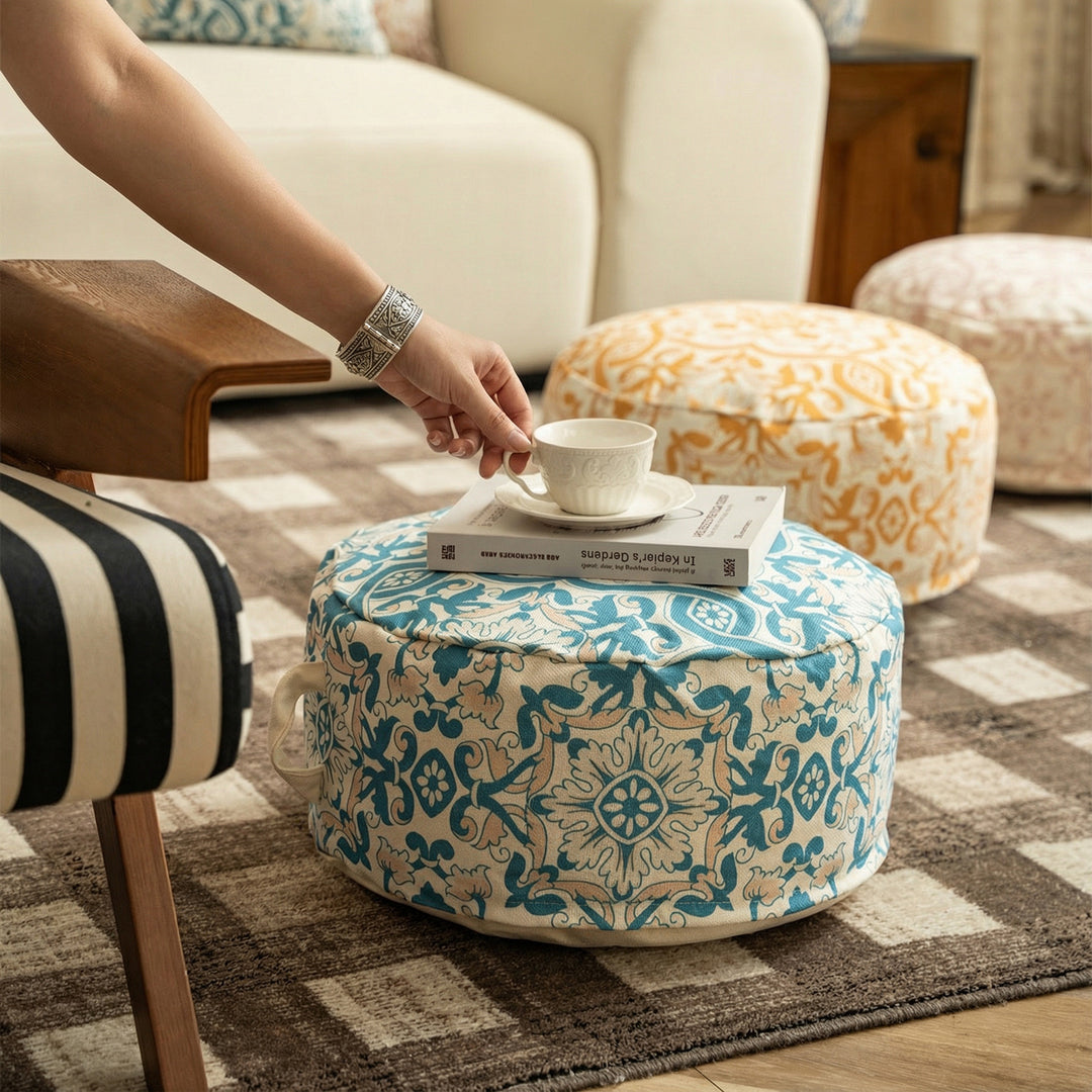 Beef floor seat pouf with handle and patterned canvas cover