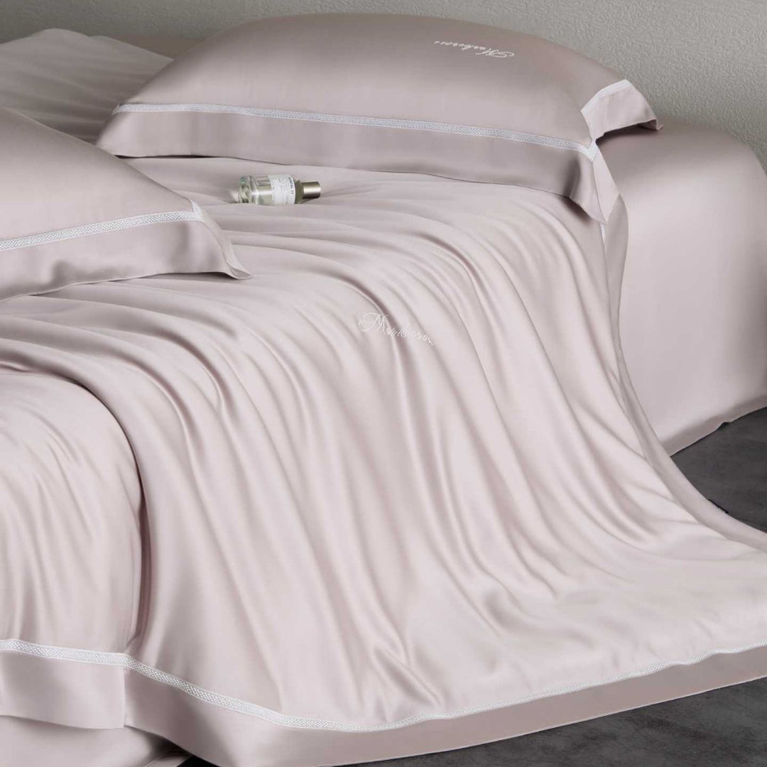 Silky-smooth cotton satin bedding set with fine decorative ribbon and pillowcases