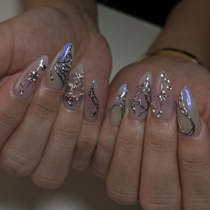 Artistic nail art with unique 3D decorations and glitter accents Kalsten