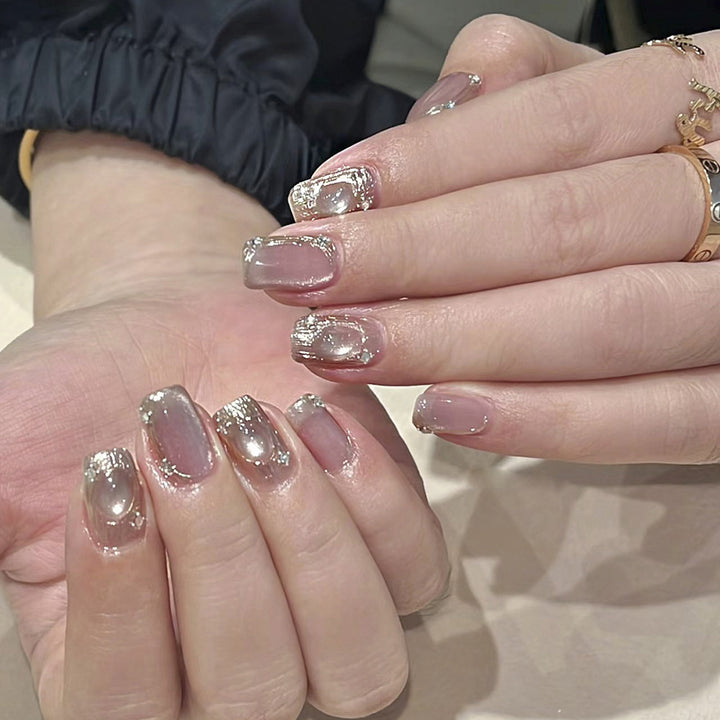Artistic Nail Art with Glitter and Ombre Effect Kalsten