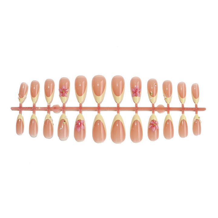 Artificial nail collection with floral accents and elegant embellishments Kalsten