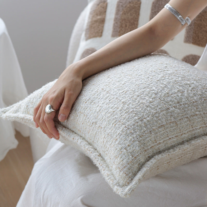 Square cushion cover made of textured bouclé blend with decorative piped seam Kalsten