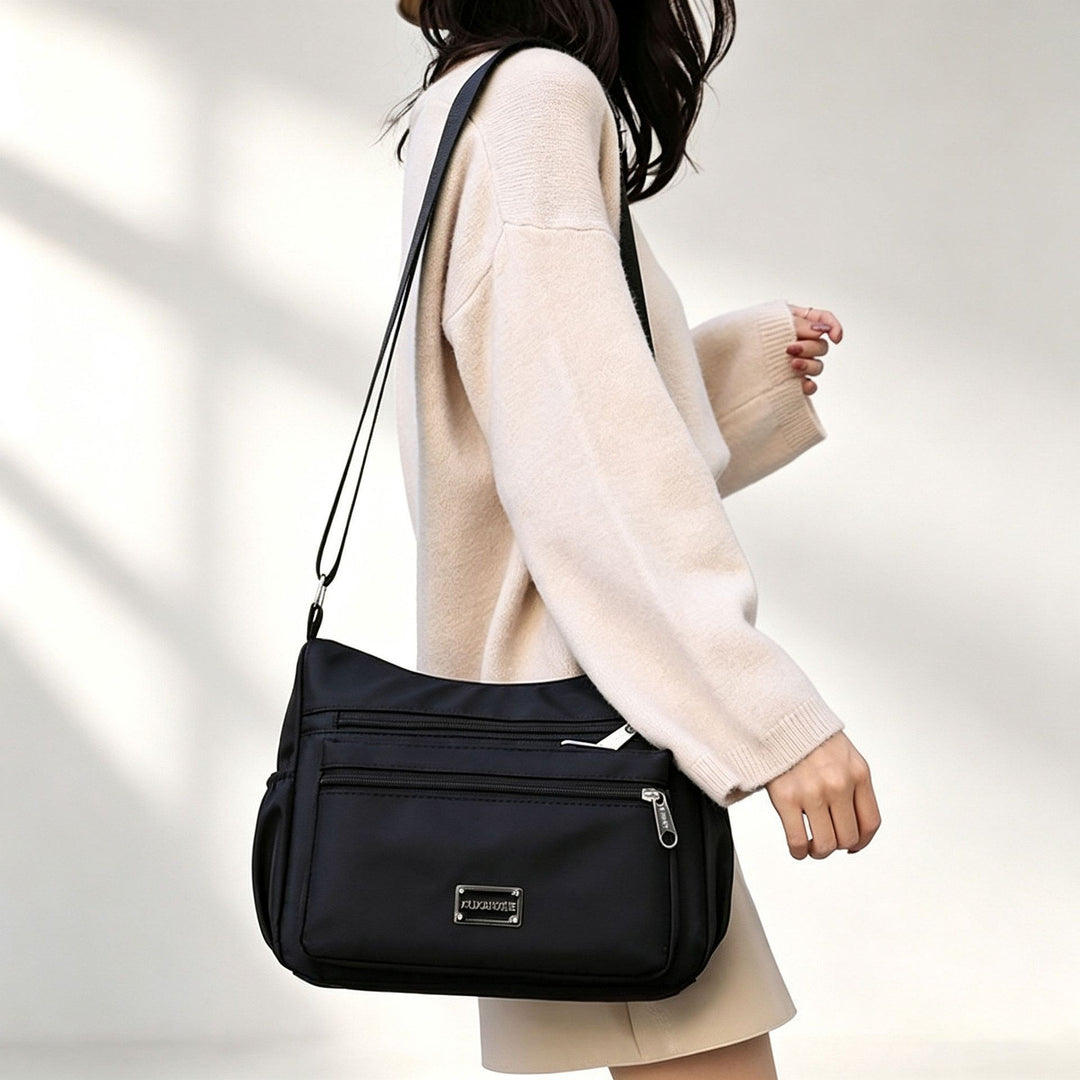 WoMulti-Pocket Crossbody Handbag