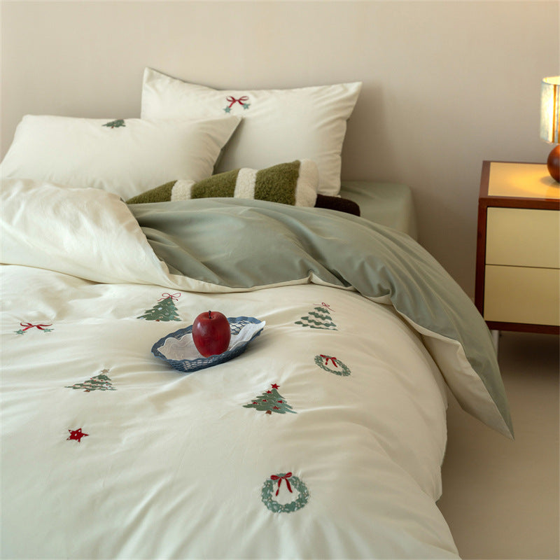 Reversible cotton bedding set with fine Christmas embroidery and satin finish reverse side
