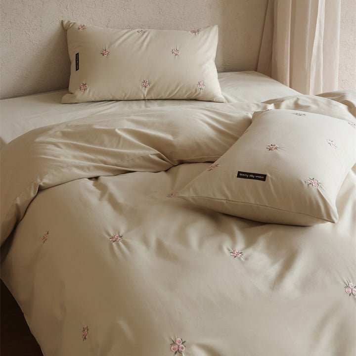 Embroidered cotton satin bedding set with subtle floral embroidery