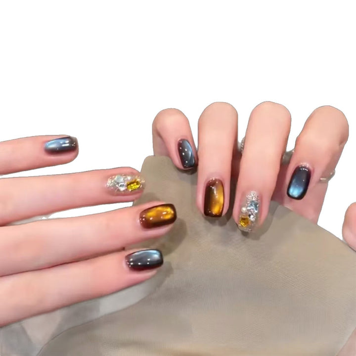 Artistic Ombre Nail Extensions with Metallic Accents
