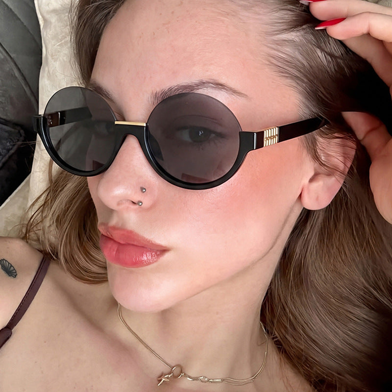 Women’s modern round sunglasses with elegant accents and UV protection Kalsten