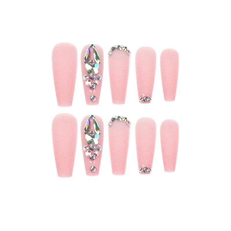 Artistic acrylic nails with glitter and rhinestone embellishments Kalsten