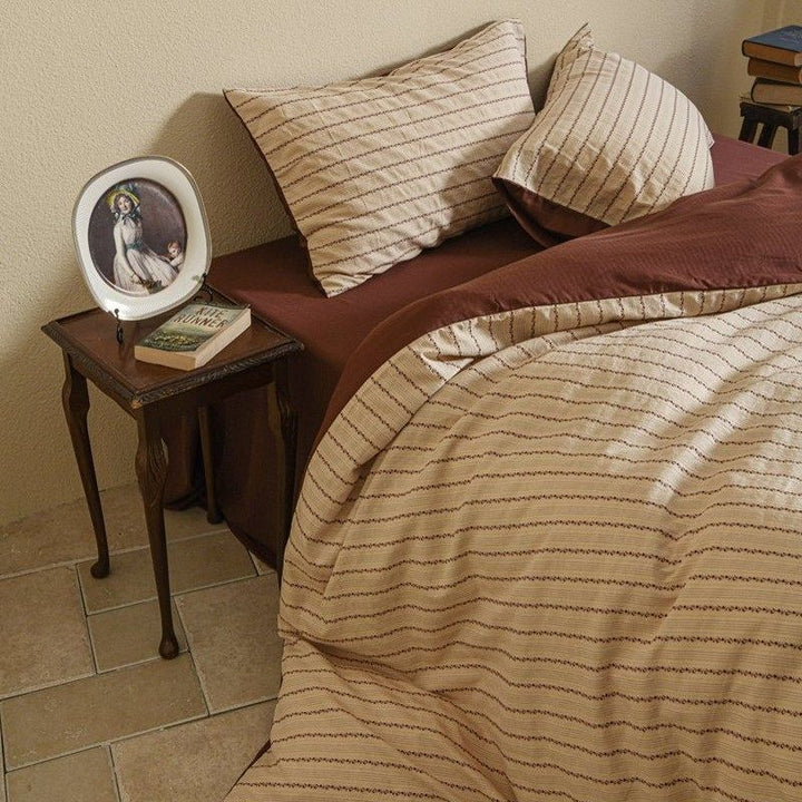 Duvet cover set made of woven cotton percale with fine striped pattern and linen look