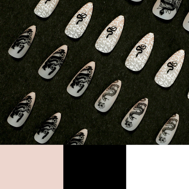 Artful nail extensions in elegant stiletto style with artistic floral and graphic designs Kalsten