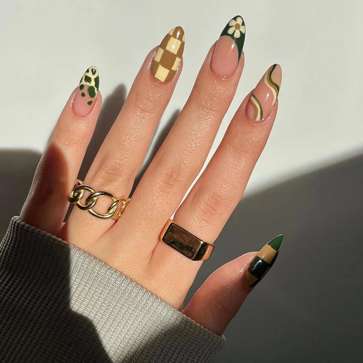 Artful nail extensions with an elegant leaf pattern Kalsten