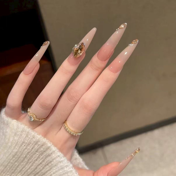 Artistic Stiletto Nail Art Extensions with Gemstone Accents
