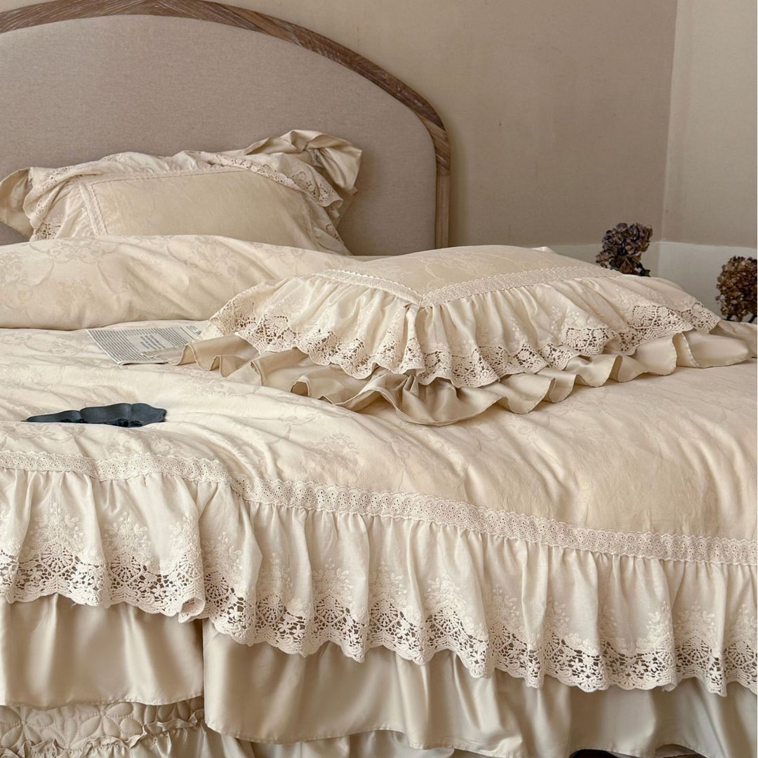 Vintage-inspired bedding set with layered ruffles and lace inset