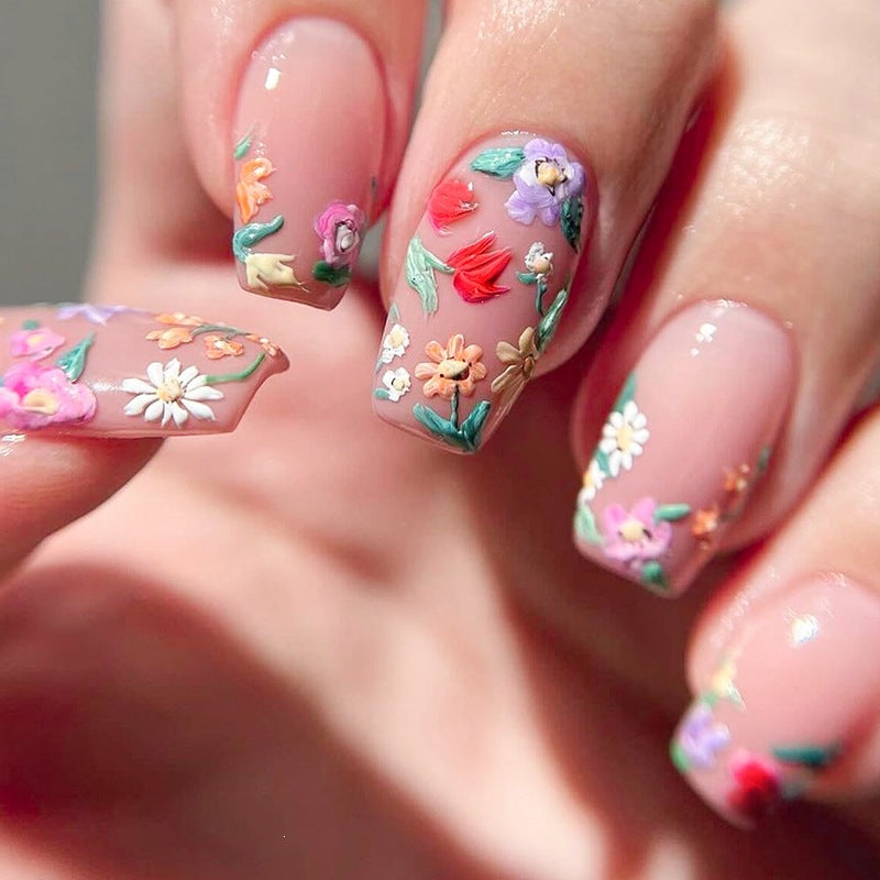 Acrylic nail set with floral motifs and glitter accents Kalsten