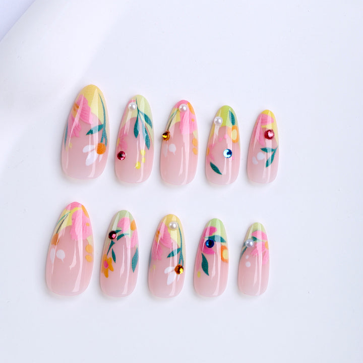 Artificial nails with flower design and glitter accents Kalsten