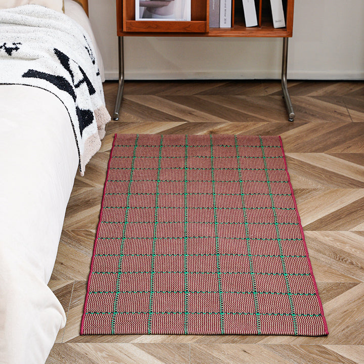 woven living room runner with fringes and geometric weave pattern