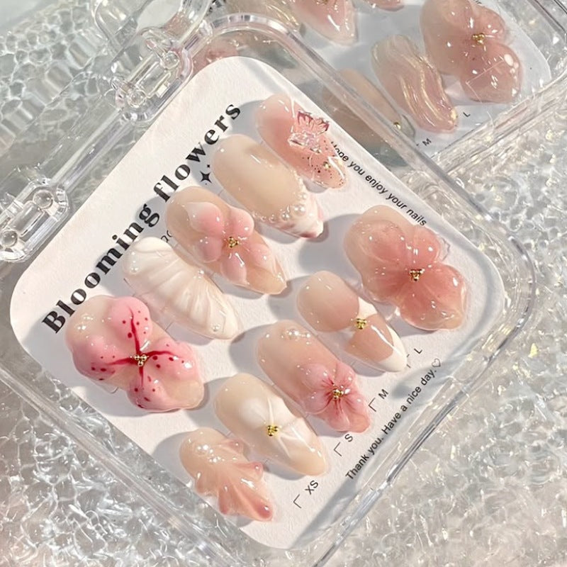 Creative nail art set with delicate flower and glitter embellishments Kalsten