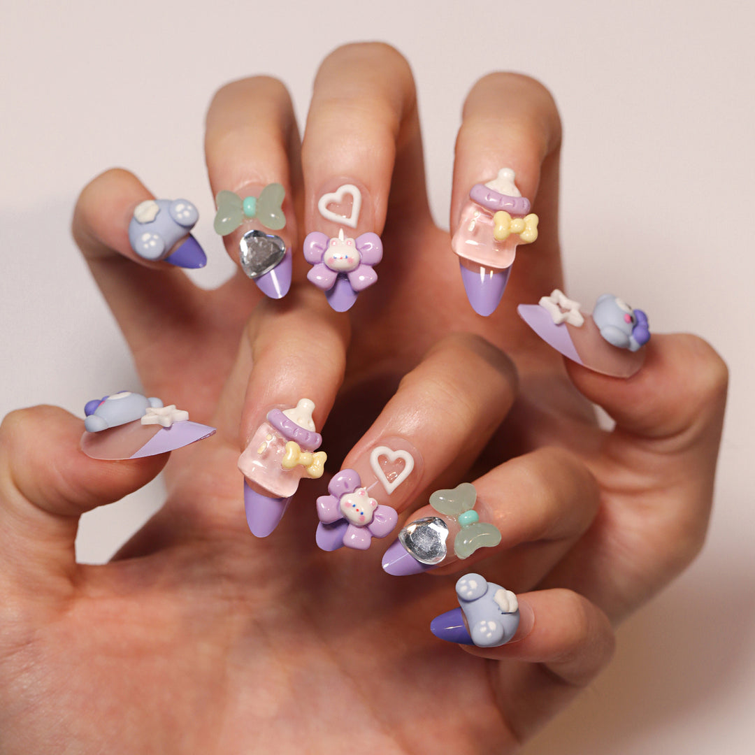Artificial nail art with playful designs Kalsten
