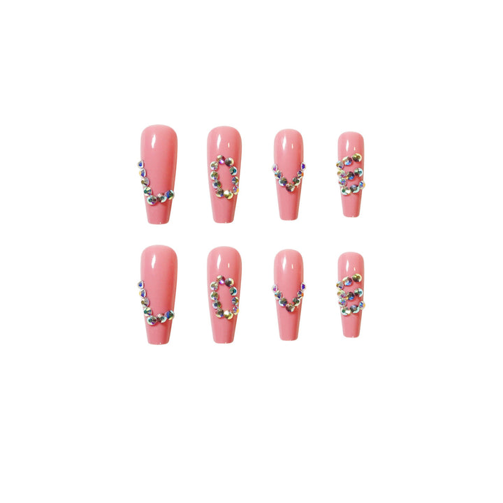 Artificial nail extensions with elegant rhinestone embellishments Kalsten