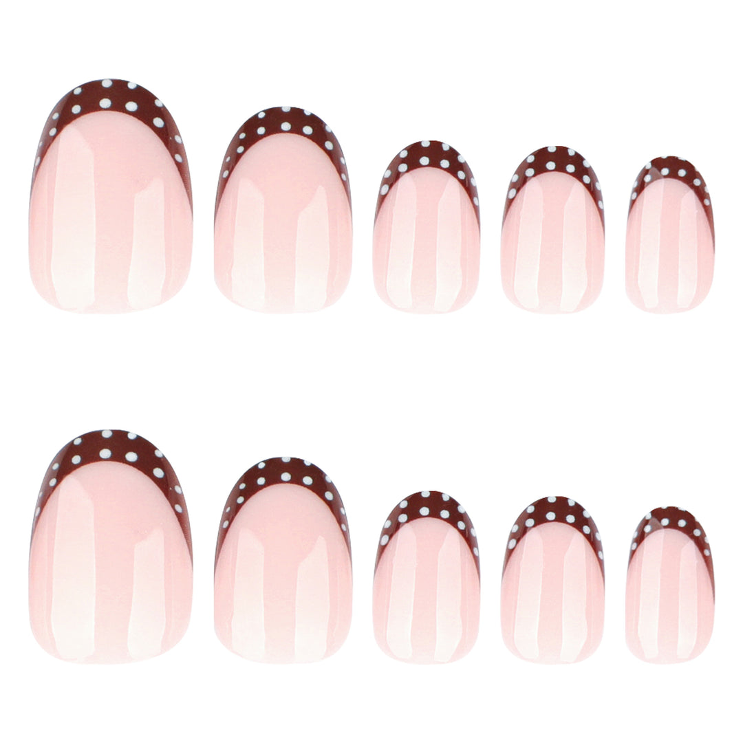 Artful nail design with elegant French tip and accents Kalsten