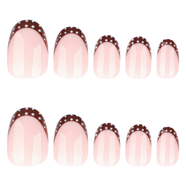 Artful nail design with elegant French tip and accents Kalsten