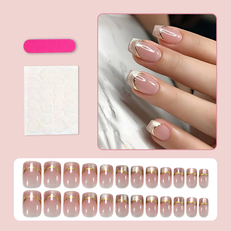 Artificial nail set with elegant glitter French tips and golden embellishments Kalsten