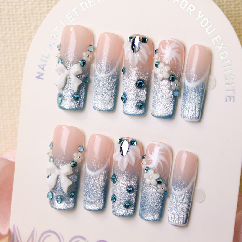 Acrylic nail set with elegant glitter design and fine embellishments Kalsten
