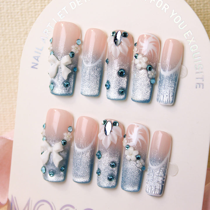 Acrylic nail set with elegant glitter design and fine embellishments Kalsten