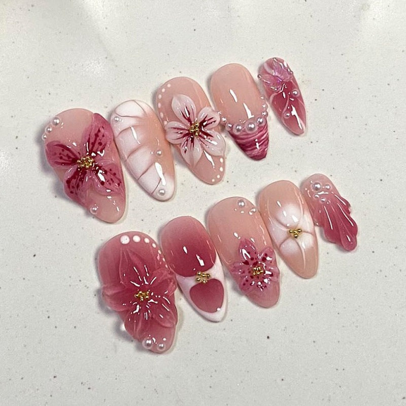 Artificial nail set with floral design and glitter accents Kalsten