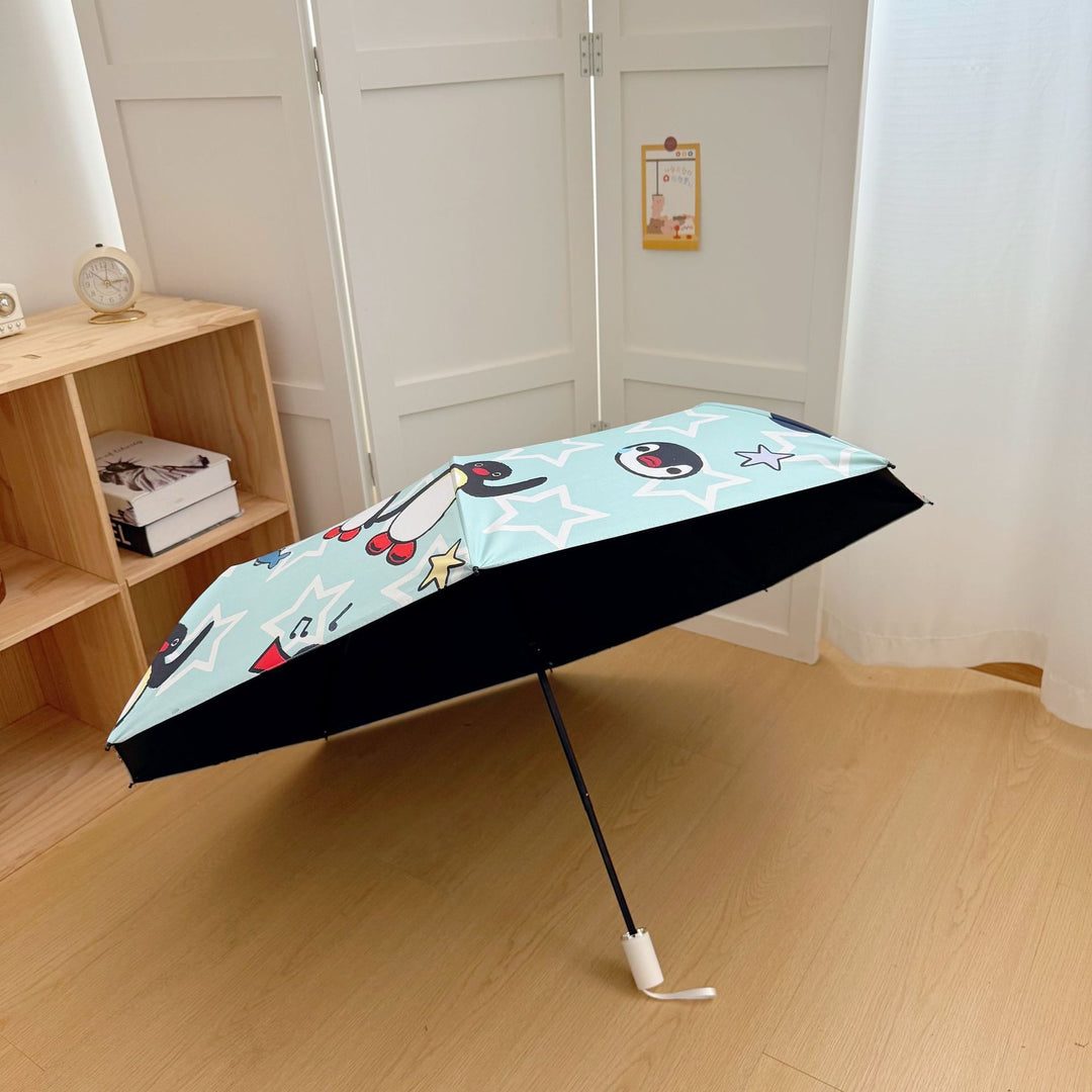 Ladies collapsible umbrella with playful penguin design Kalsten