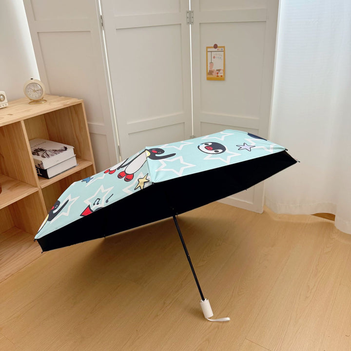 Ladies collapsible umbrella with playful penguin design Kalsten