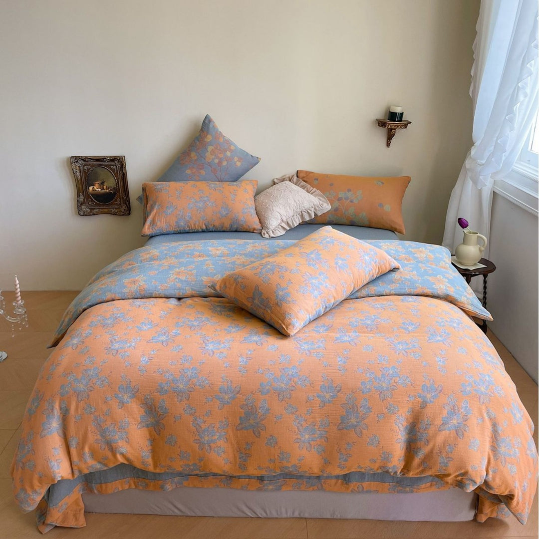 Reversible bedding set made of cotton-linen with delicate floral print and quilted blanket