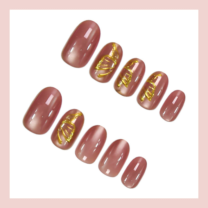 Acrylic nail set with elegant golden accents and shimmering finish Kalsten
