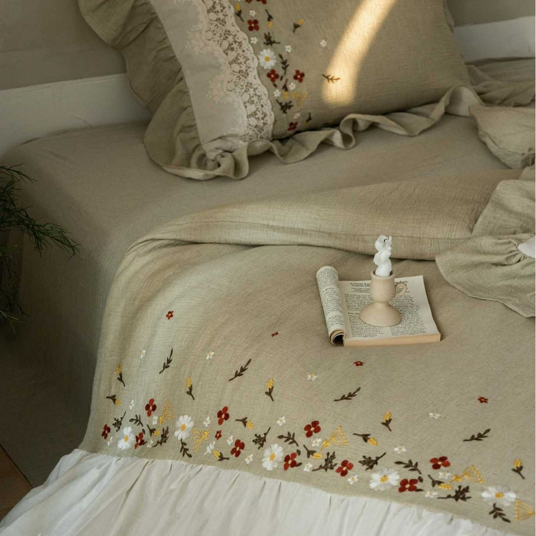 Romantic bedding set with lace bed skirt, embroidered floral decor and ruffle