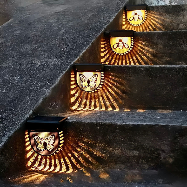 Decorative Solar-Powered Outdoor Wall Lanterns With Laser-Cut Insect And Floral Panels And Warm LED Ambiance Kalsten