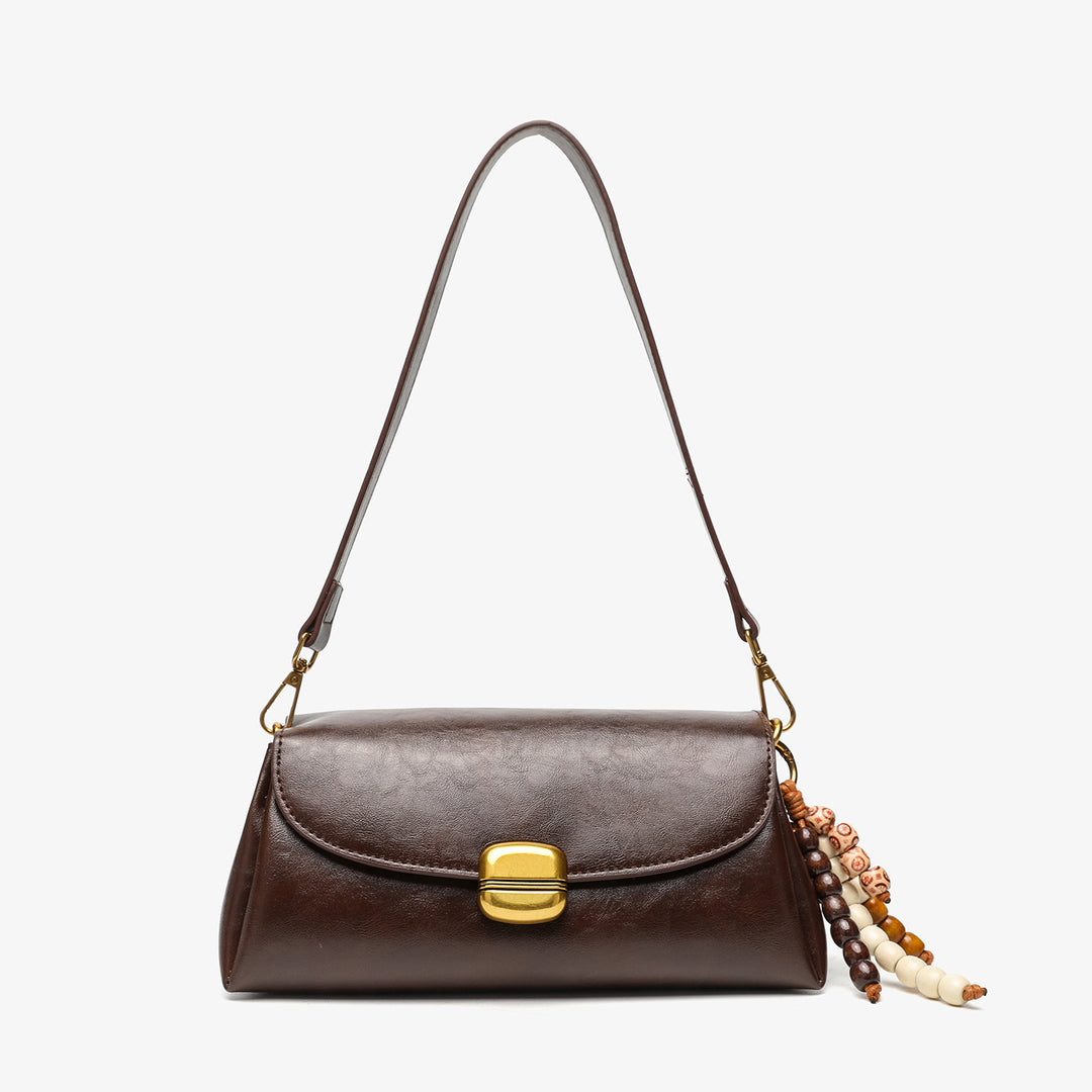 Elegant Handheld Shoulder Bag with Decorative Beaded Charm