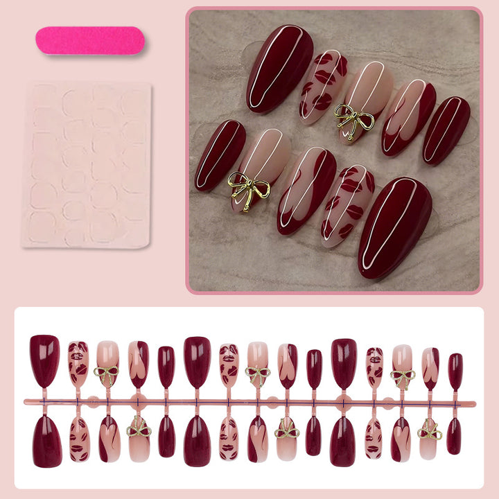 Artificial nail set with elegant bow and kiss mouth designs Kalsten