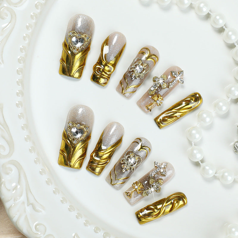 Artificial nail set with luxurious gold embellishments Kalsten