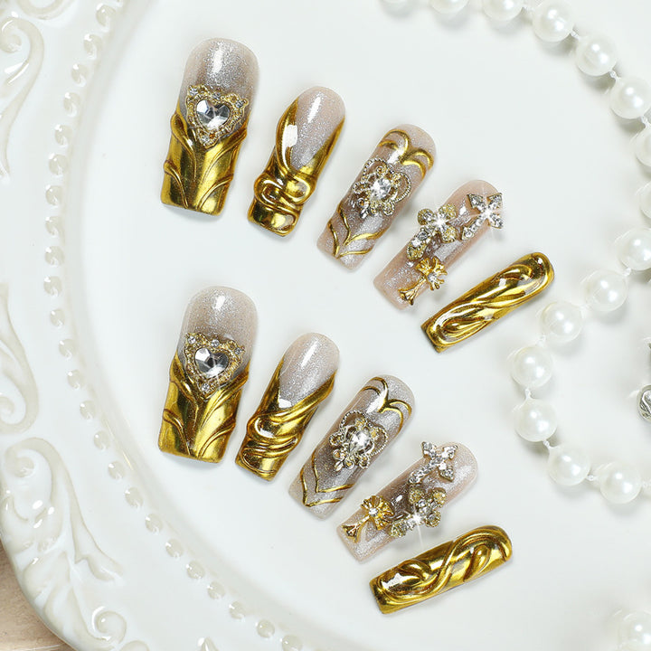 Artificial nail set with luxurious gold embellishments Kalsten