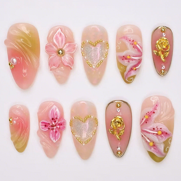 Artificial nail set with delicate flower designs and glamorous accents Kalsten